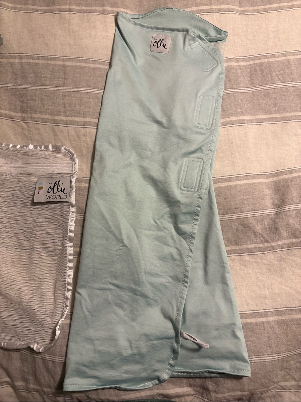 The Ollie Swaddle in Sky blue with Laundry Bag, Used Good Condition